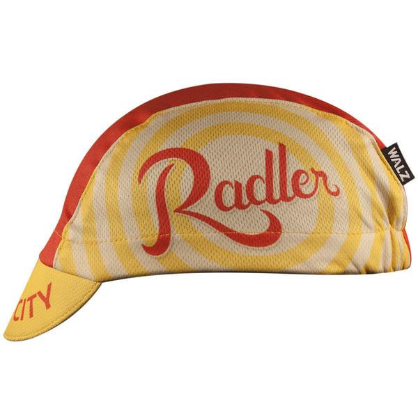 Boulevard Brewing Co. 3-Panel Technical Cycling Cap. Red and yellow cap with Boulevard logo, Radler text on side, Kansas City text on brim.  Side view.