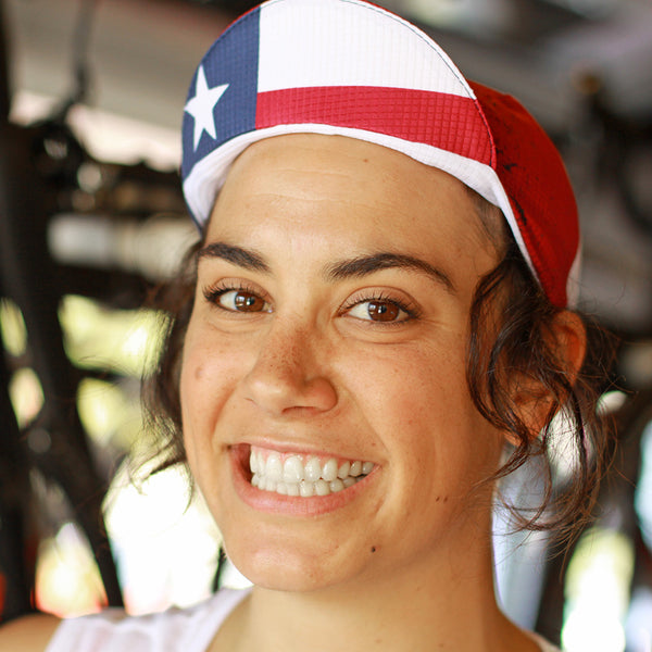 Woman wearing the Texas technical cycling cap.
