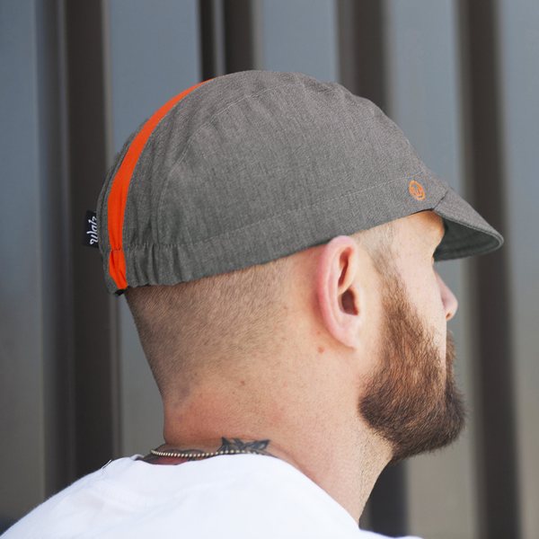 Back view of man wearing collegiate fast cap.