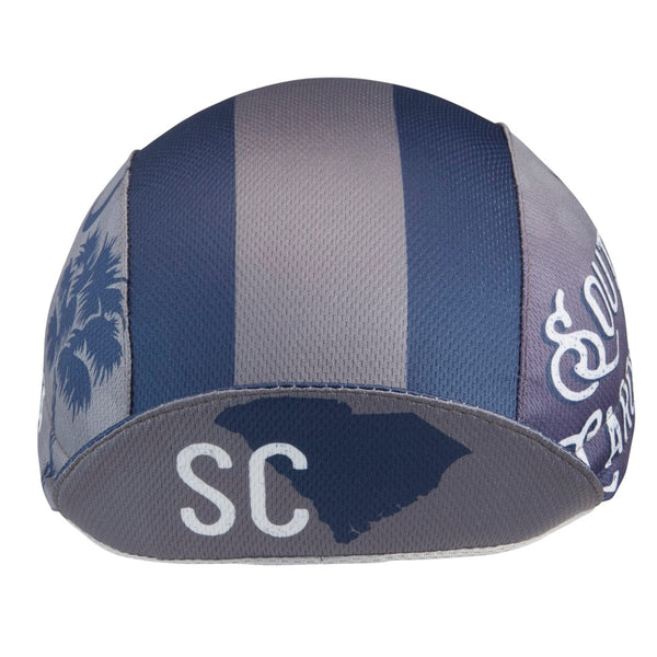 South Carolina Technical 3-Panel Cycling Cap. Blue and gray cap with South Carolina text and palmetto imagery on side. SC text and South Carolina state outline under brim.  Brim up front view.