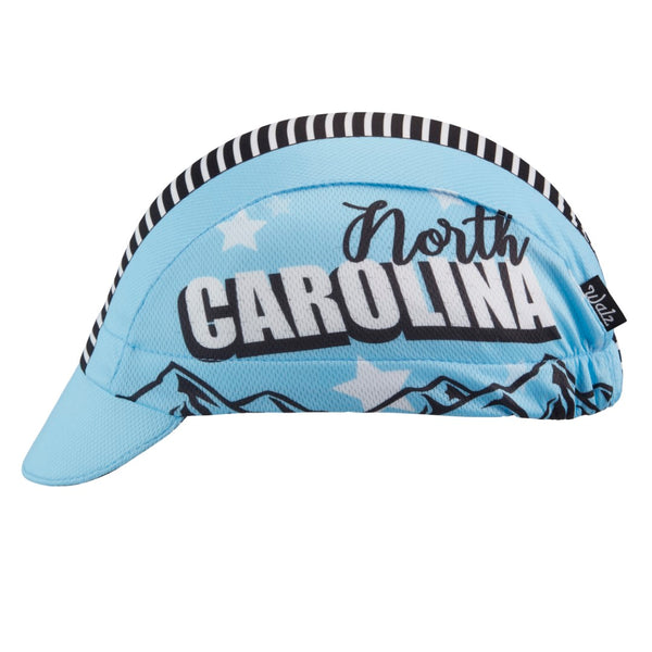 North Carolina Technical 3-Panel Cycling Cap.  Baby blue cap with black and white stripes on top and North Carolina text on side.  Side view.