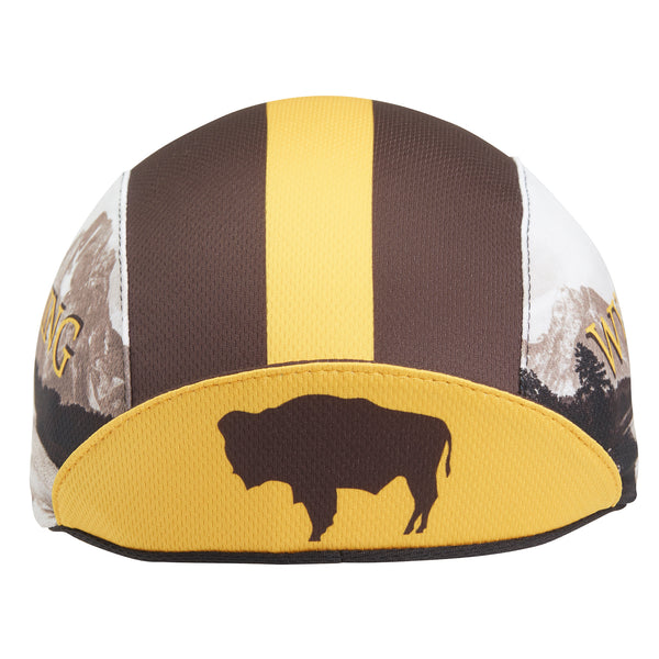 Wyoming Technical 3-Panel Cycling Cap. Brown cap with yellow stripe and Grand Teton imagery on side. Buffalo icon under brim.  Brim up front view.