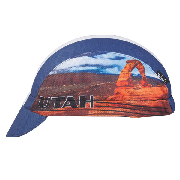Utah Technical 3-Panel Cycling Cap. Blue and white cap with Delicate Arch image on side. Side view.