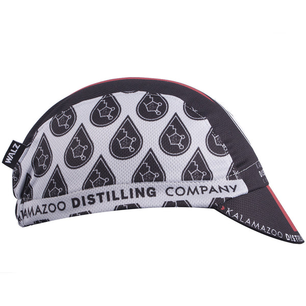 Kalamazoo Distilling Co. 3-Panel Technical Cycling Cap. Black and white cap with Kalamazoo Distilling Company imagery.  Side view.