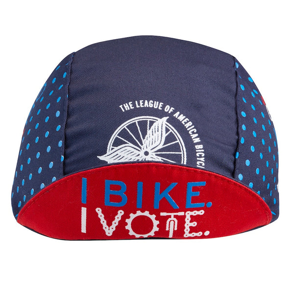 Cap For a Cause - League of American Bicyclists Technical 3-Panel cap.  Navy blue cap with light blue polka dots.  Features Vote text and League of American Bicyclists imagery.  Brim up angled view.