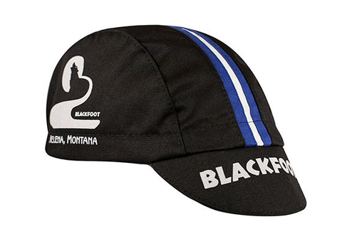 Blackfoot River Brewing Co. Cycling Cap Cotton 3-Panel. Black cap with Blue/White Stripe and Blackfoot Brewing logo on the side.  Angled view.