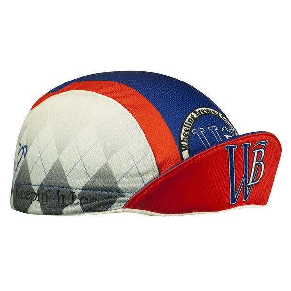 Wheeling Brewing Co. Technical 3-Panel Cycling Cap. Blue and orange cap with gray argyle pattern on side.  Wheeling brewing company imagery on side, front, and brim.  Brim up angled view.