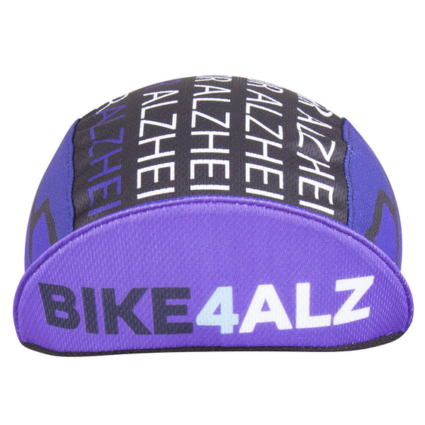 Cap for a Cause - "Bike4Alz" 3-Panel Technical Cycling Cap.  Purple and black cap with mountain and forest imagery and Alzheimer's text and BIKE4ALZ text under brim.  Brim up front view.