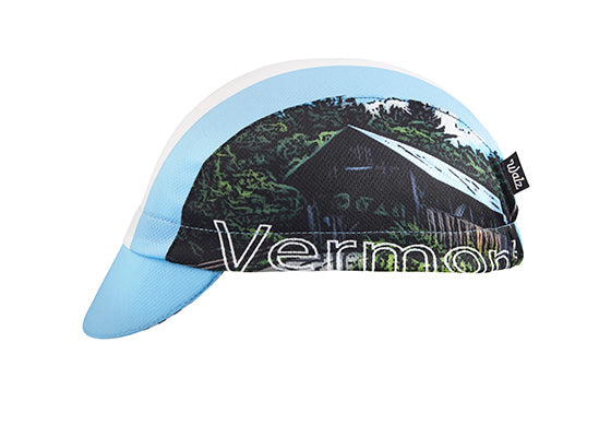Vermont Technical 3-Panel Cycling Cap.  Light blue and white cap with covered bridge image on side.  Side view.