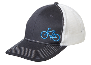 Navy and white trucker cap with embroidered light blue bicycle on front.  Angled view.