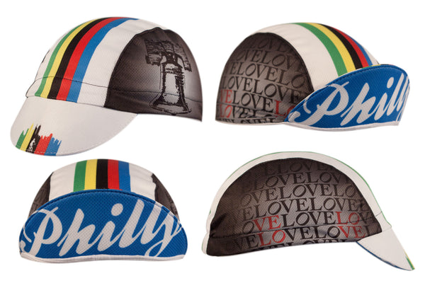 Philadelphia Technical 3-Panel Cycling Cap.  White, blue, and black cap with green, yellow, black, red, and blue stripes on top and LOVE print on side.  Philly text under brim.  4 different views.
