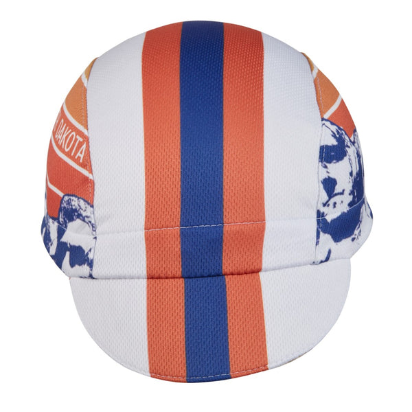 South Dakota Technical 3-Panel Cycling Cap. White and orange cap with blue and orange stripes.  SOUTH DAKOTA text and Mount Rushmore imagery on side.  Front view.