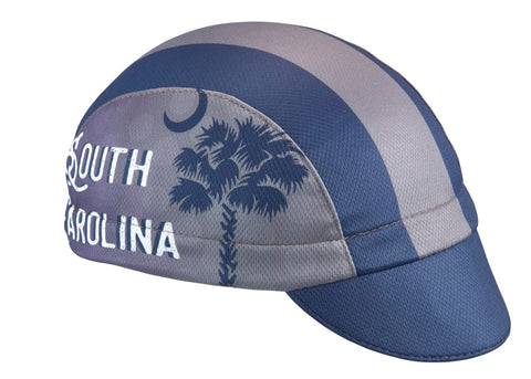 South Carolina Technical 3-Panel Cycling Cap. Blue and gray cap with South Carolina text and palmetto imagery on side.  Angled view.