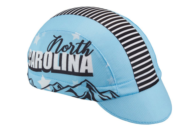 North Carolina Technical 3-Panel Cycling Cap.  Baby blue cap with black and white stripes on top and North Carolina text on side.  Angled view.