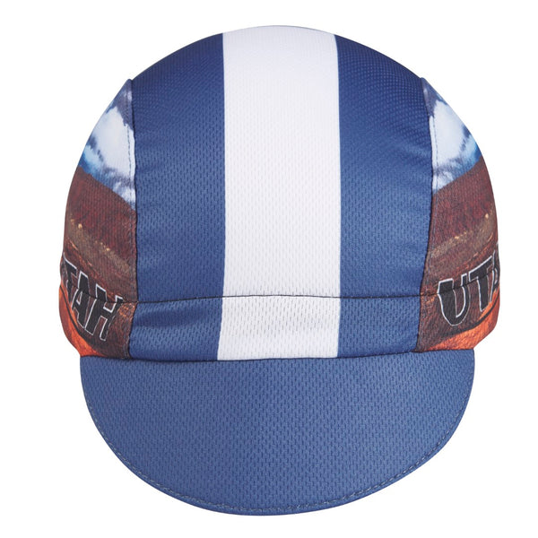 Utah Technical 3-Panel Cycling Cap. Blue and white cap with Delicate Arch image on side. Front view.