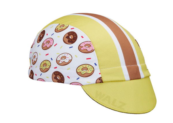 "Donut" Technical 3-Panel Cap.  Yellow cap with brown and white stripes and donut print.  Angled View.