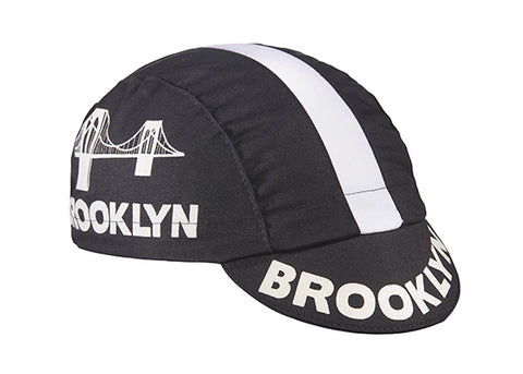Brooklyn Black Cotton 3-Panel Cycling Cap.  White stripe with Brooklyn bridge logo and Brooklyn text on side and brim.  Angled view.