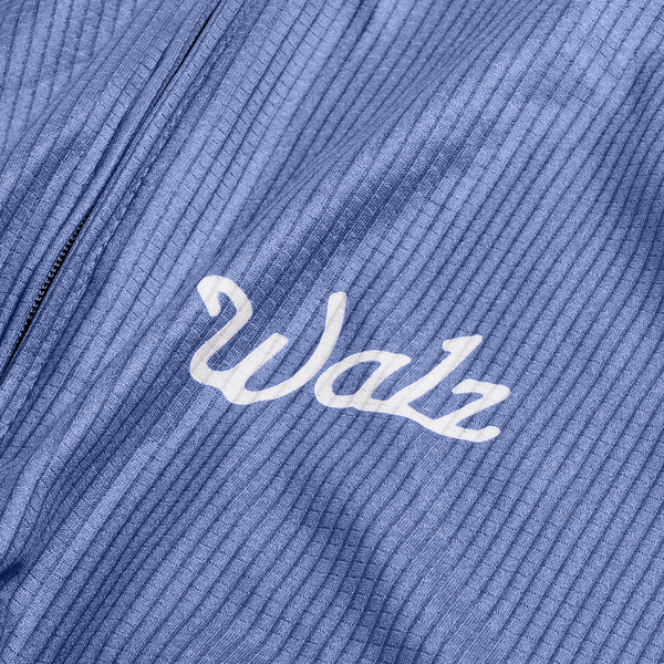 Close up of Walz logo on the blue jersey fabric.