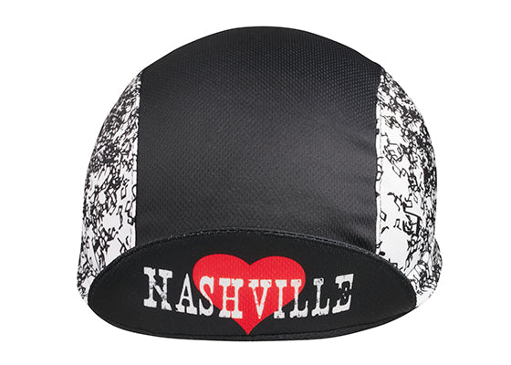 Nashville 3-Panel Technical Cycling Cap.  Black and white cap with jumbled musical note print on side. Heart icon with NASHVILLE text under brim. Brim up front view.