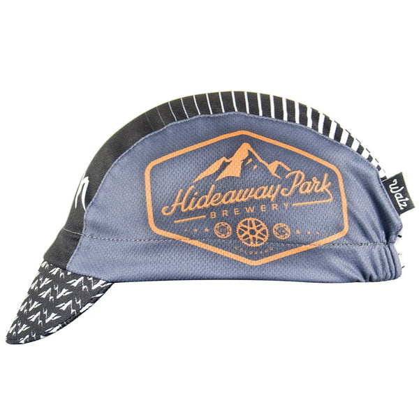 Hideaway Park Brewery Technical 3-Panel Cap.  Black and gray cap with mountains on front and brim and Hideaway Park Brewing logo on the side.  Side view.