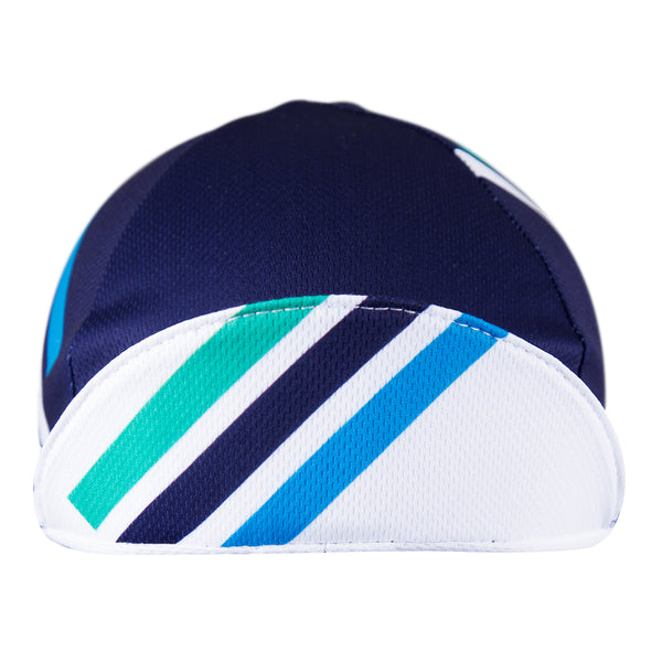 "Sea Breeze" Technical 4-Panel Cap.  Blue cap with green white and blue stripes.  Front view. Bill up.  White underside bill with stripes.