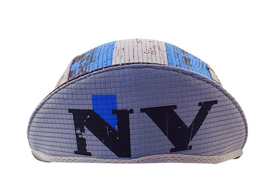 Nevada 3-Panel Technical Cycling Cap.  Gray, blue, and black cap with NV text under brim.  Brim up front view.
