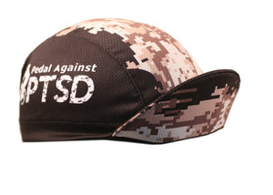 Cap For a Cause - "Pedal Against PTSD" 3-Panel Technical Cycling Cap.  Brown and tan camo with Pedal Against PTSD text on side.  Brim up angled view.